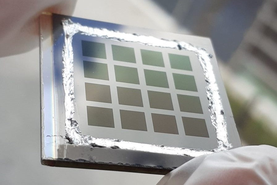 Silver-alloyed CIGS solar cell with transparent indium back contacts, 12% efficiency