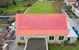 Gymnasium in Eppingen with red BIPV roof
