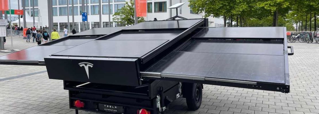 Tesla with a solar flare trailer on display: What’s behind it