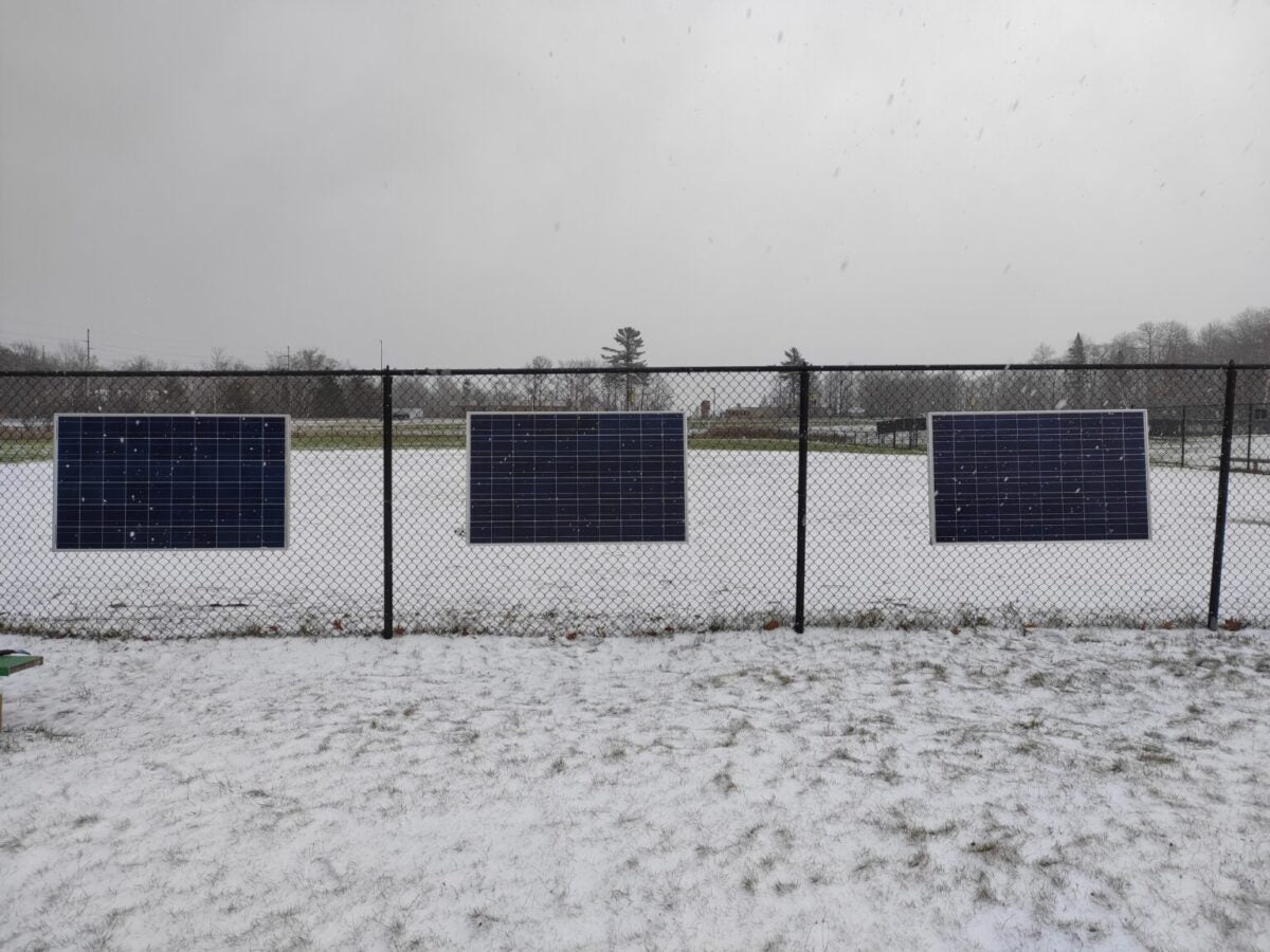 Using existing fences as near-zero-cost racking solution for PV deployment