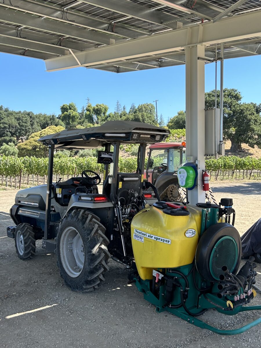 Off-grid solar canopy charges electric tractor at California winery